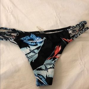 Floral and black bikini bottoms
